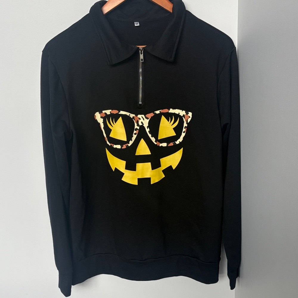 Black Halloween Sweatshirt with Yellow Pumpkin Design
